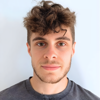 headshot of Joe smiling at camera