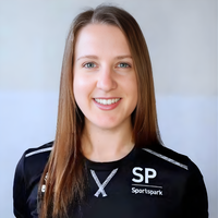 Headshot of Connie smiling at camera.