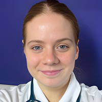 Headshot of Anna smiling at the camera.