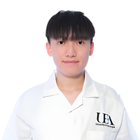 Samuel Leung smiling at camera.