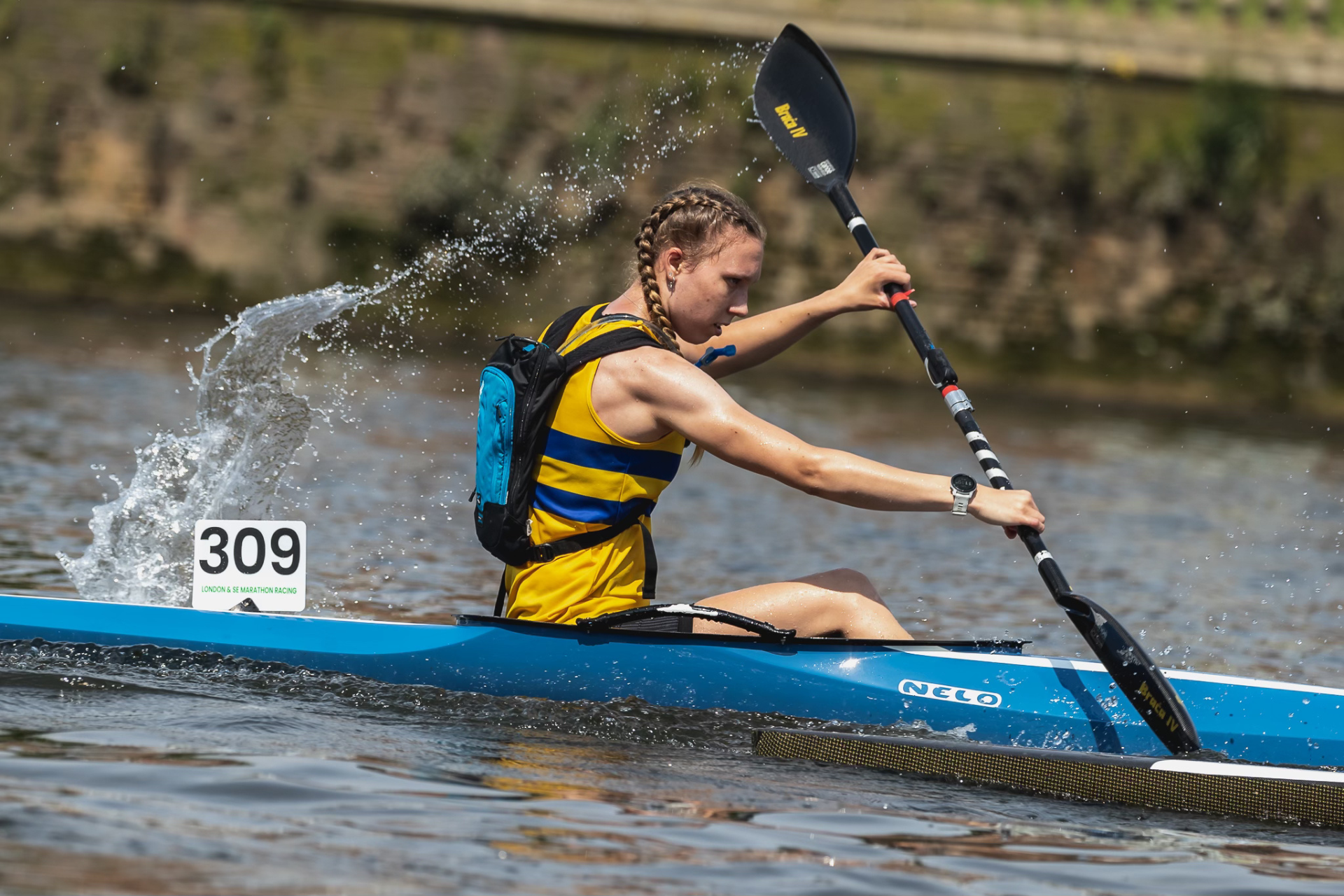 Nerys in canoe in a lake.