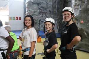 children climbing at holiday club