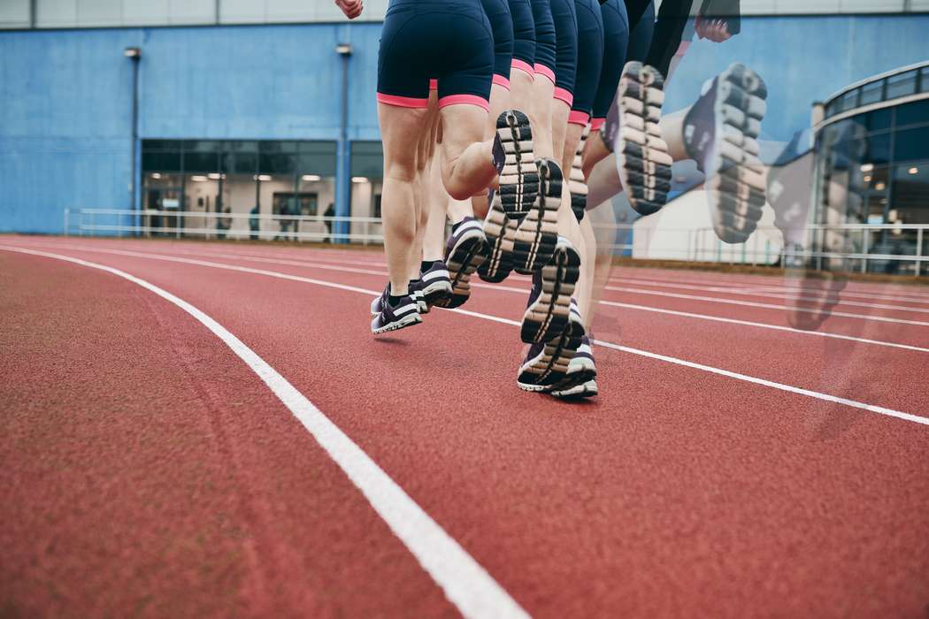 Runner on track time lapse