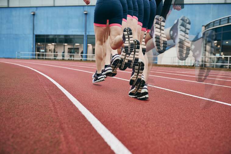 Runner on track time lapse